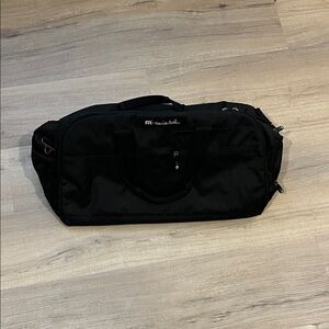 Travis Mathew Black Duffel Bag